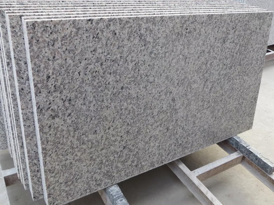 Tiger Skin White Granite.jpg